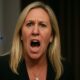 create an image of Marjorie Taylor Greene outrage