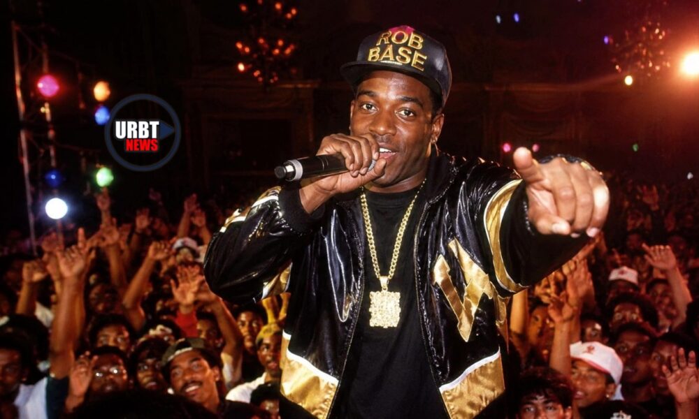 The hip-hop world is mourning Rob Base’s death. The legendary Harlem rapper's explosive energy and timeless anthems helped define late-1980s rap. Remembering Rob Base: The Voice Behind “It Takes Two” Passes Away at 59 after changing the sound of hip-hop. Rob Base, born Robert Ginyard, reportedly passed away on May 22, 2026. He battled cancer privately and was 59 years old. Millions of fans associate Rob Base with “It Takes Two.” The iconic hit is one of hip-hop’s most recognizable and influential records. Released in 1988 with DJ E-Z Rock, the song became a cultural phenomenon. It crossed genres, generations, and demographics. Decades later, its opening lines remain recognizable at parties and events. Early Days in Harlem Born and raised in Harlem, New York, Rob Base grew up during hip-hop’s formative years. He and DJ E-Z Rock met as children. They developed a friendship rooted in music and performance. The growing rap movement inspired the pair. They began crafting records with high-energy beats and crowd-moving lyrics. Their chemistry led to a recording deal with Profile Records. Everything changed when “It Takes Two” exploded onto the charts. The track sampled Lyn Collins’ “Think (About It)." It fused hip-hop with dance influences. At that time, rap music was still fighting for acceptance. The song became a platinum-selling anthem. It helped open commercial doors for future artists. The Rise of "It Takes Two" “It Takes Two”'s success brought additional hits including “Joy and Pain” and “Get on the Dance Floor.” These records further established Rob Base & DJ E-Z Rock. They were pioneers blending club energy with street credibility. Their debut album, also titled It Takes Two, achieved commercial success. It remains a defining hip-hop release. Many artists from the 1980s faded from public memory. However, Rob Base continued performing across the country. He became a staple on nostalgic hip-hop tours. This included the popular “I Love the ’90s Tour.” Fans celebrated the music that shaped an era. Crowds still erupted when the beat of “It Takes Two” filled arenas. Tributes and Legacy Friends, artists, and fans flooded social media with tributes. This followed news of his death. Rob Base, ‘It Takes Two’ Rapper, Dies at 59 and hip-hop legends honored his influence on rap culture. Grandmaster Flash and Fat Joe remembered him as an energetic performer. He brought joy to audiences everywhere. The loss carries weight because DJ E-Z Rock died in 2014. He passed because of complications from diabetes. Their partnership represented one of hip-hop’s most beloved duos. Their friendship and music encouraged people to dance and celebrate life. They helped prove rap could dominate mainstream radio. Rob Base's Enduring Influence Beyond music, Rob Base symbolized an important moment in hip-hop. He also helped prove rap music could dominate mainstream radio. It still maintained its roots in Black urban culture. Many record executives doubted rap’s future. Artists like Rob Base demonstrated the genre’s power. His influence is still heard today. Countless artists sampled “It Takes Two.” They also referenced or drew inspiration from it. This included major acts across hip-hop and pop. The record’s DNA remains embedded in modern culture. This makes Rob Base’s legacy hard to erase. A Lasting Impact Rob Base leaves behind family, friends, and devoted fans. He also leaves a permanent place in hip-hop history. His music captured the excitement of rap's transformation. It went from neighborhood expression to worldwide culture. He emerged from Harlem, New York, during hip-hop’s growth. As tributes continue pouring in, one thing remains clear. Whenever “It Takes Two” plays, Rob Base’s voice will move generations. He created records that moved from parties into mainstream culture. His music represented a turning point for hip-hop. It combined club energy, hooks, and appeal without abandoning urban music. Subscribe to URBT News